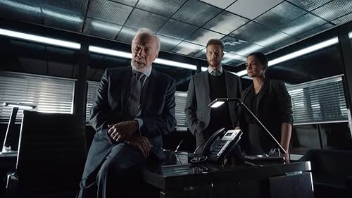 Christopher Plummer, Kris Holden-Ried, and Archie Panjabi in Departure (2019)