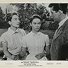 Joan Crawford, Lee Patterson, and Heather Sears in The Story of Esther Costello (1957)