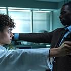 Omar Sy and Nathalie Emmanuel in The Killer (2024)