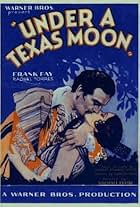 Frank Fay and Raquel Torres in Under a Texas Moon (1930)