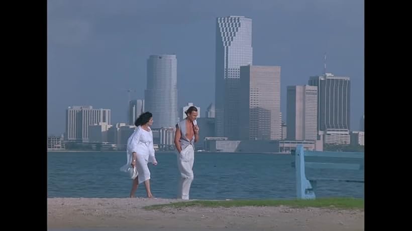 Liam Neeson and Saundra Santiago in Miami Vice (1984)