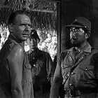 Dale Ishimoto and Gerald Sim in King Rat (1965)