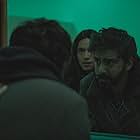 Rahul Kohli and Katie Parker in Next Exit (2022)