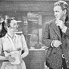 Ella Raines and Forrest Tucker in Ride the Man Down (1952)