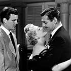 Clark Gable, Lana Turner, and Robert Sterling in Somewhere I'll Find You (1942)