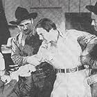 George Douglas, Curley Dresden, Jack Ingram, and Matty Kemp in The Adventures of the Masked Phantom (1939)