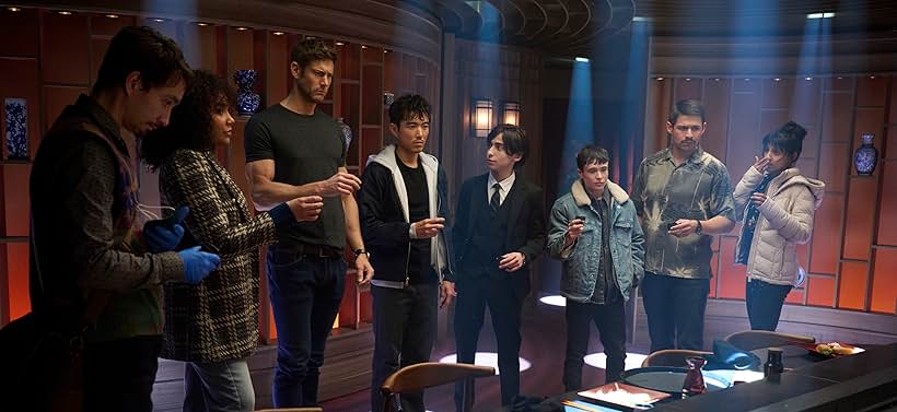 Elliot Page, Robert Sheehan, Tom Hopper, David Castañeda, Justin H. Min, Ritu Arya, Aidan Gallagher, and Emmy Raver-Lampman in The Umbrella Academy (2019)