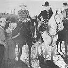 George Reeves, William Boyd, Jay Kirby, Herbert Rawlinson, and Teddi Sherman in Colt Comrades (1943)