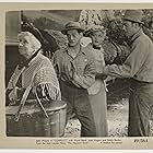 John Wayne, Eddie Borden, Margaret Mann, and Jean Rogers in Conflict (1936)