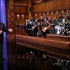 Jay Leno, James 'Kamal' Gray, Questlove, Tariq Trotter, James Poyser, The Roots, Frank Walker, Kirk Douglas, Damon Bryson, Mark Kelley, David Guy, and Ian Hendrickson-Smith in The Tonight Show Starring Jimmy Fallon (2014)