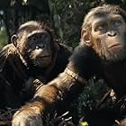 Travis Jeffery, Owen Teague, and Lydia Peckham in Kingdom of the Planet of the Apes (2024)