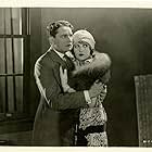 Billie Dove and Bryant Washburn in Try and Get It (1924)