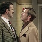 John Cleese and Bruce Boa in Fawlty Towers (1975)