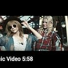 Taylor Swift and Halle Arbaugh in Swift's music video "I Knew You Were Trouble"