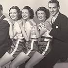 Rita Hayworth, Julie Bishop, Patricia Farr, John Gallaudet, and Charles Quigley in Girls Can Play (1937)