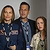 Josh Charles, Hilary Swank, and Talitha Eliana Bateman in Away (2020)