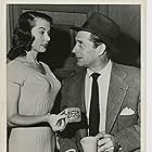 Reed Hadley and June Wurster in Racket Squad (1950)