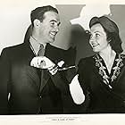 Lynn Bari and Preston Foster in News Is Made at Night (1939)