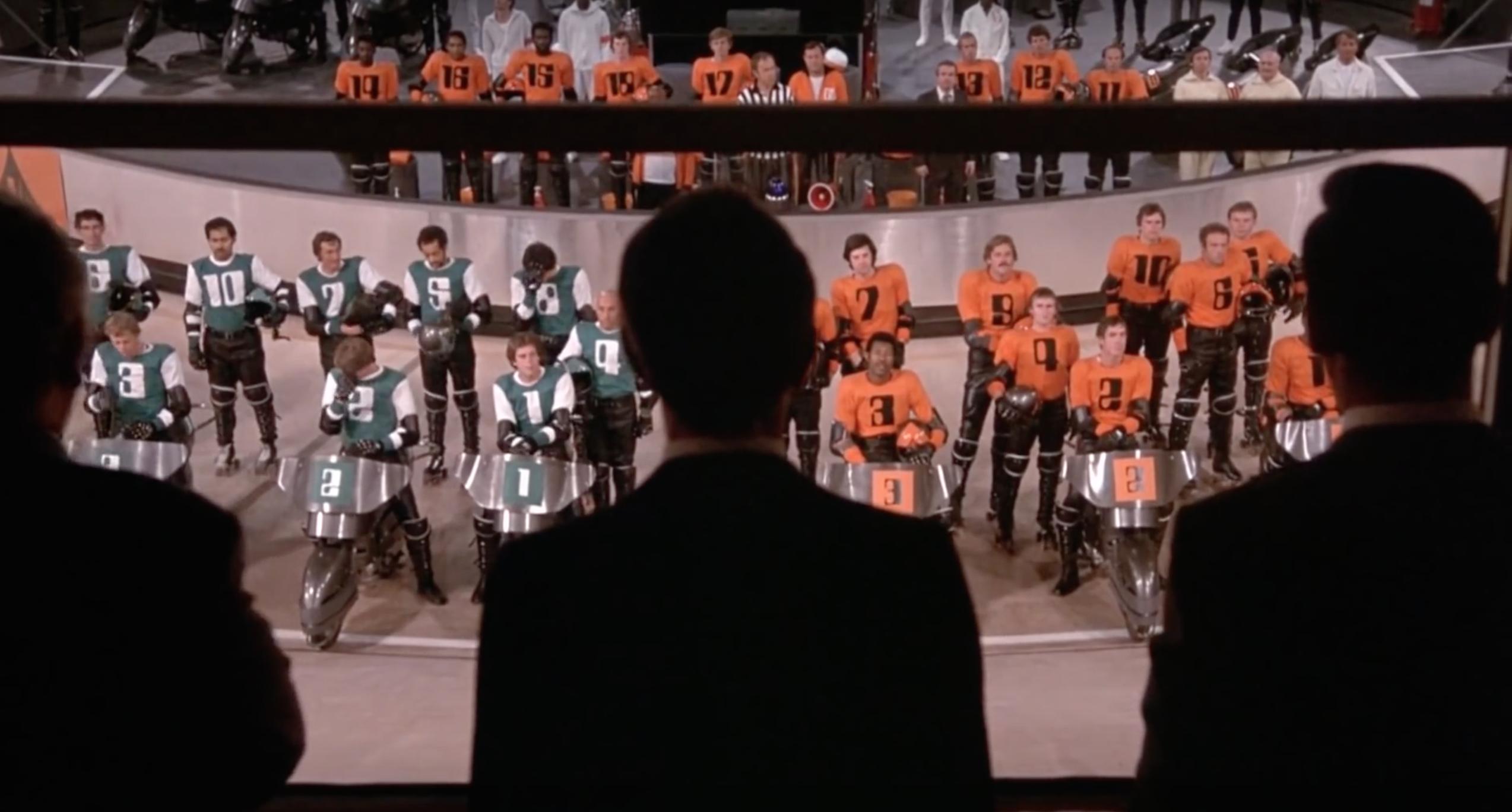 James Caan, Craig R. Baxley, John Beck, Tony Brubaker, and Bob Minor in Rollerball (1975)