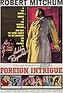 Robert Mitchum, Frédéric O'Brady, Geneviève Page, and Ingrid Thulin in Foreign Intrigue (1956)