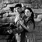 Alan Curtis and Patricia Morison in Hitler's Madman (1943)