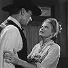 Gary Cooper and Grace Kelly in High Noon (1952)