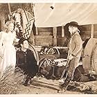 Johnny Mack Brown, Bill Cody Jr., and Louise Stanley in The Oregon Trail (1939)