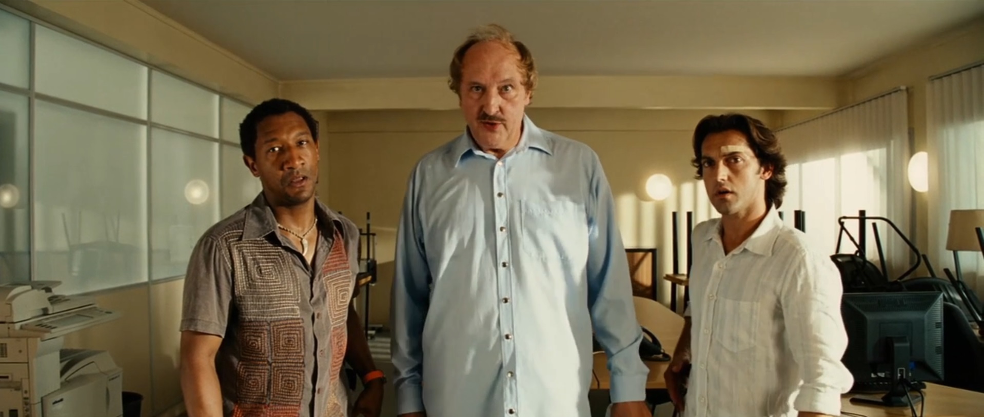 Frédéric Diefenthal, Bernard Farcy, and Edouard Montoute in Taxi 4 (2007)