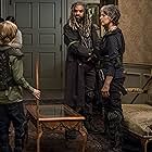 Melissa McBride, Khary Payton, and Macsen Lintz in The Walking Dead (2010)