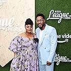 Gbemisola Ikumelo and Aaron Jennings at an event for A League of Their Own (2022)