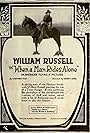 William Russell in When a Man Rides Alone (1919)