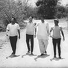 Samit Bhanja, Soumitra Chatterjee, Subhendu Chatterjee, and Rabi Ghosh in Aranyer Din Ratri (1970)