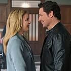 Brennan Elliott and Amanda Schull in Marry Go Round (2022)