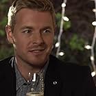 Rick Cosnett in The Wrong Husband (2019)