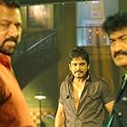 Nagarjuna Akkineni and Raghu Babu in Bhai (2013)