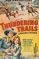 Jimmie Dodd, Nell O'Day, Bob Steele, and Tom Tyler in Thundering Trails (1943)