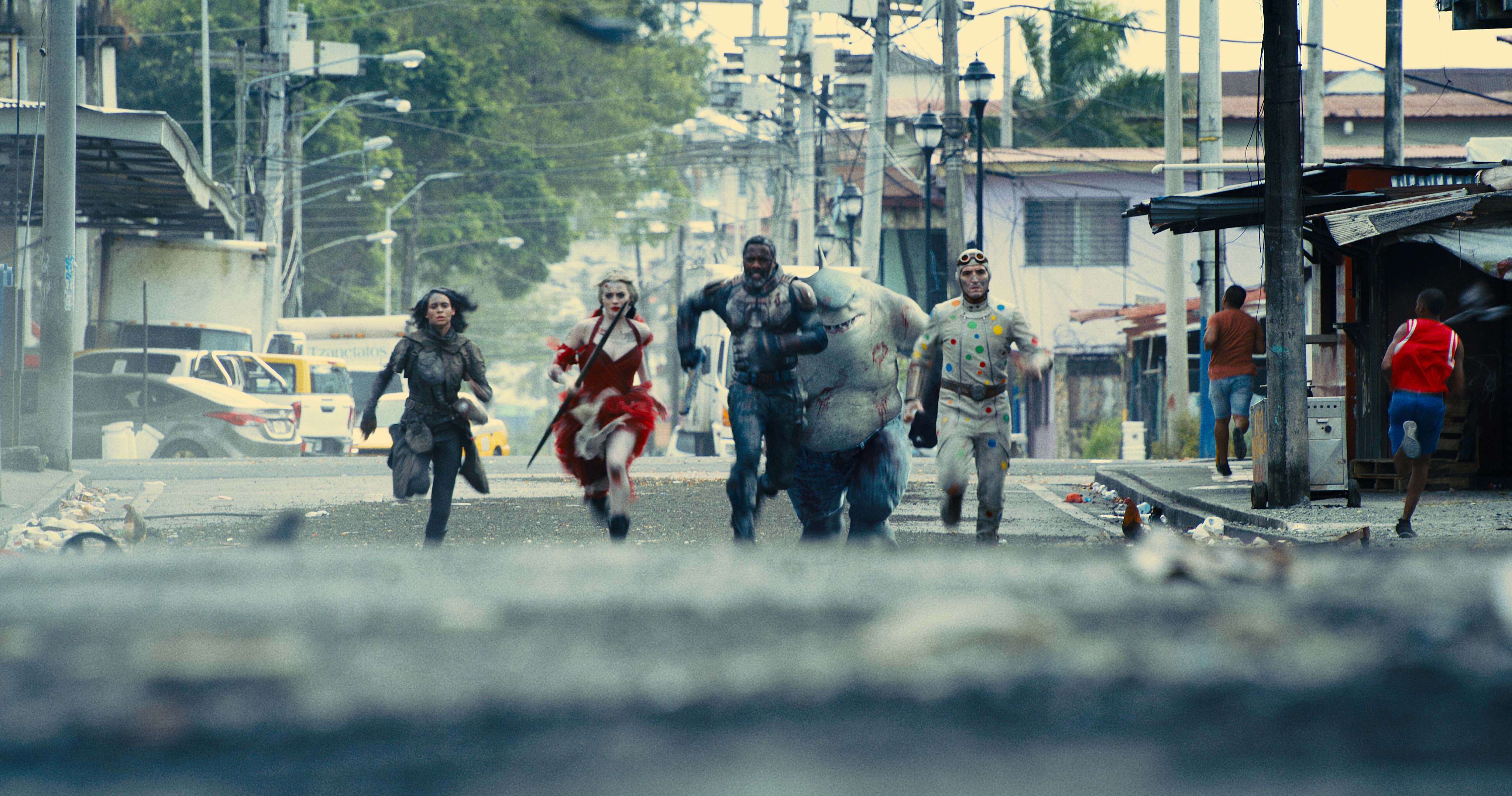 Sylvester Stallone, Steve Agee, Idris Elba, David Dastmalchian, Margot Robbie, and Daniela Melchior in The Suicide Squad (2021)