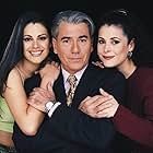 Luz Elena González, Lourdes Munguía, and Otto Sirgo in Por un beso (2000)