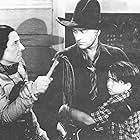 William Boyd, Emily Fitzroy, and Dickie Jones in The Frontiersmen (1938)