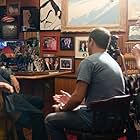 Derek Wayne Johnson interviewing Academy Award nominee Burt Reynolds for "John G. Avildsen: King of the Underdogs" (2017).