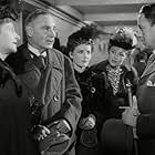 Alec Guinness, Petula Clark, Henry Edwards, Glynis Johns, and Alison Leggatt in The Promoter (1952)