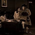 Roscoe 'Fatty' Arbuckle, Alice Lake, and Agnes Neilson in The Butcher Boy (1917)