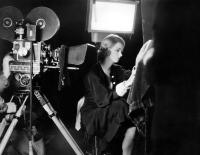 CARELESS LADY, Joan Bennett writing a note which will be used in the film, on set, 1932. ©Fox Film Corporation, TM & Copyright