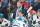 MONTREAL, CANADA - JANUARY 11:  Assistant coach of the San Jose Sharks Ryan Warsofsky, handles bench duties during the second period against the Montreal Canadiens at the Bell Centre on January 11, 2024 in Montreal, Quebec, Canada.  The San Jose Sharks defeated the Montreal Canadiens 3-2.  (Photo by Minas Panagiotakis/Getty Images)