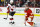 CALGARY, CANADA - NOVEMBER 05: Nico Hischier #13 of the New Jersey Devils tries to tip the puck in front of Jacob Markstrom #25 of the Calgary Flames at the Scotiabank Saddledome on November 5, 2022, in Calgary, Alberta, Canada. (Photo by Leah Hennel/Getty Images)