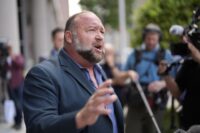 Company affiliated with Alex Jones seeks to disqualify The Onion’s auction bid on Infowars