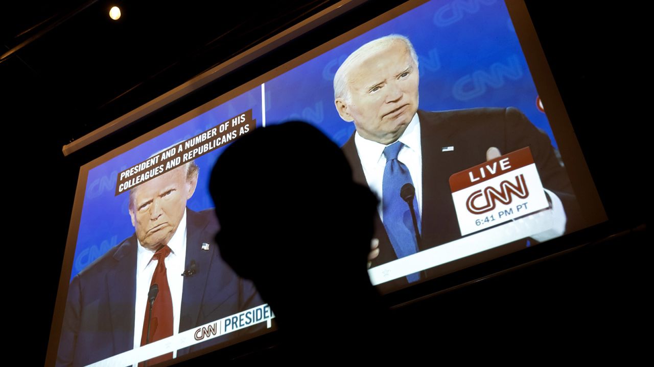 A man watches the CNN presidential debate during a watch party at Union Pub in Washington, DC on Thursday.