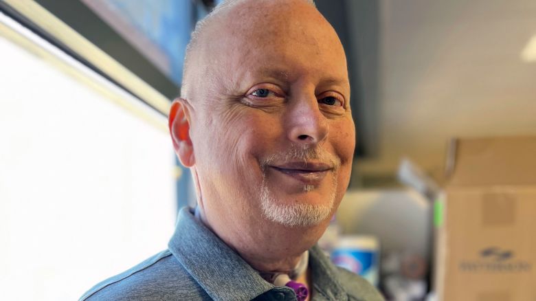 In this photo provided by the Mayo Clinic, Marty Kedian poses for a photo in Mayo Clinic’s Head and Neck Regenerative Medicine Laboratory in Scottsdale, Ariz., on June 12, 2024. Kedian regained his voice after surgeons removed his cancerous larynx and, in a pioneering move, immediately replaced it with a donated one. (Mayo Clinic via AP)