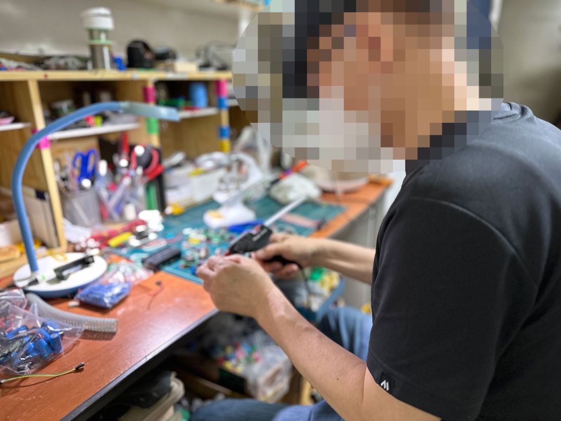 Choi pictured in the apartment rented by his activist group as a base of operations. A portion of this image has been obscured to protect the subject's identity.