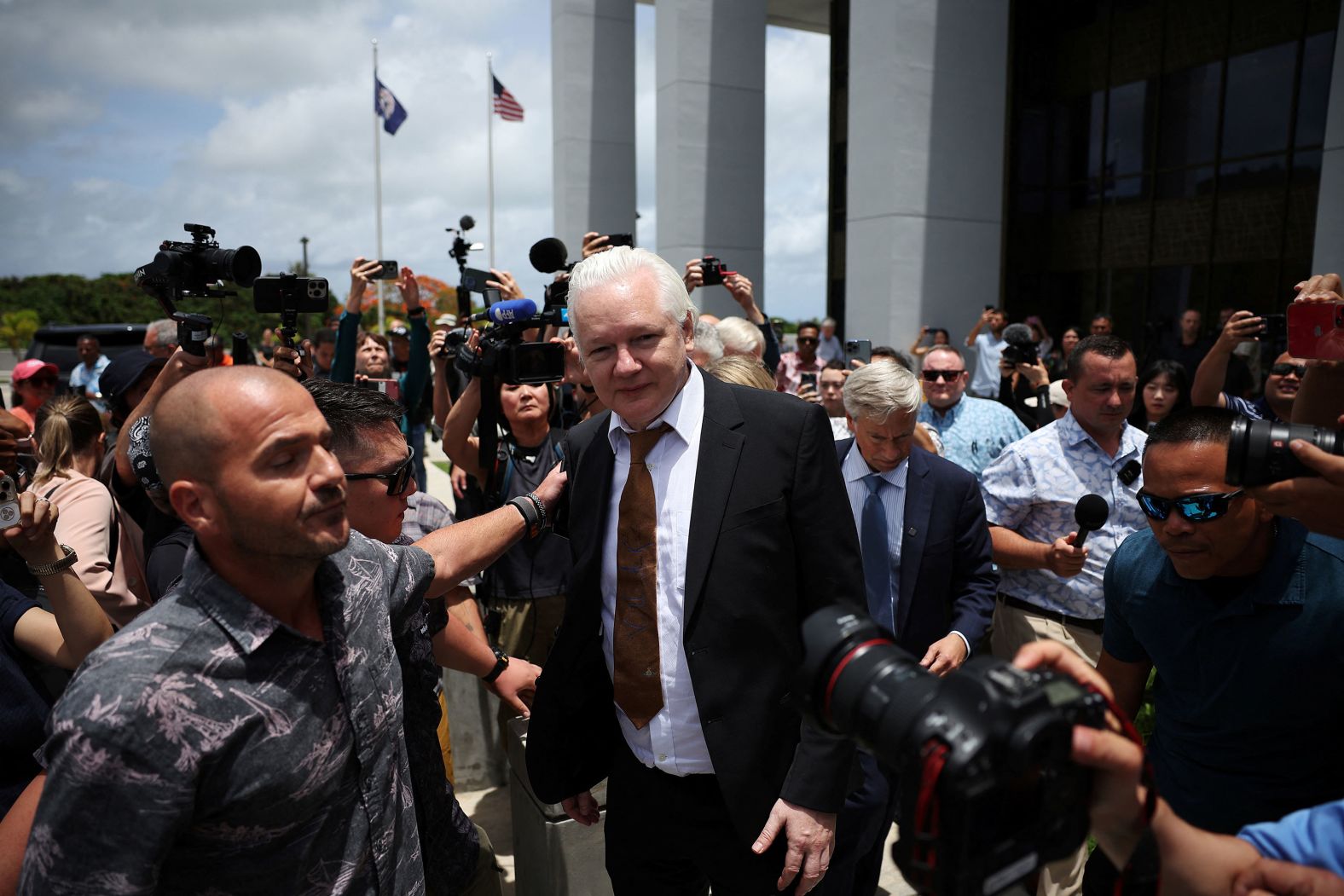 WikiLeaks founder <a href="https://www.cnn.com/2021/12/13/world/gallery/julian-assange/index.html">Julian Assange</a> leaves a courthouse in Saipan, on the Northern Mariana Islands, after <a href="https://www.cnn.com/2024/06/25/world/julian-assange-plea-deal-hearing-intl/index.html">a judge signed off on his plea deal with US authorities</a> on Wednesday, June 26. Assange pleaded guilty to conspiring unlawfully to obtain and disseminate classified information over his alleged role in one of the largest breaches of classified material in US military history. In return, he received a 62-month sentence — credited to the time he served in a high-security prison in London while he fought extradition to the United States. He then traveled home to Australia, a free man for the first time in 12 years.